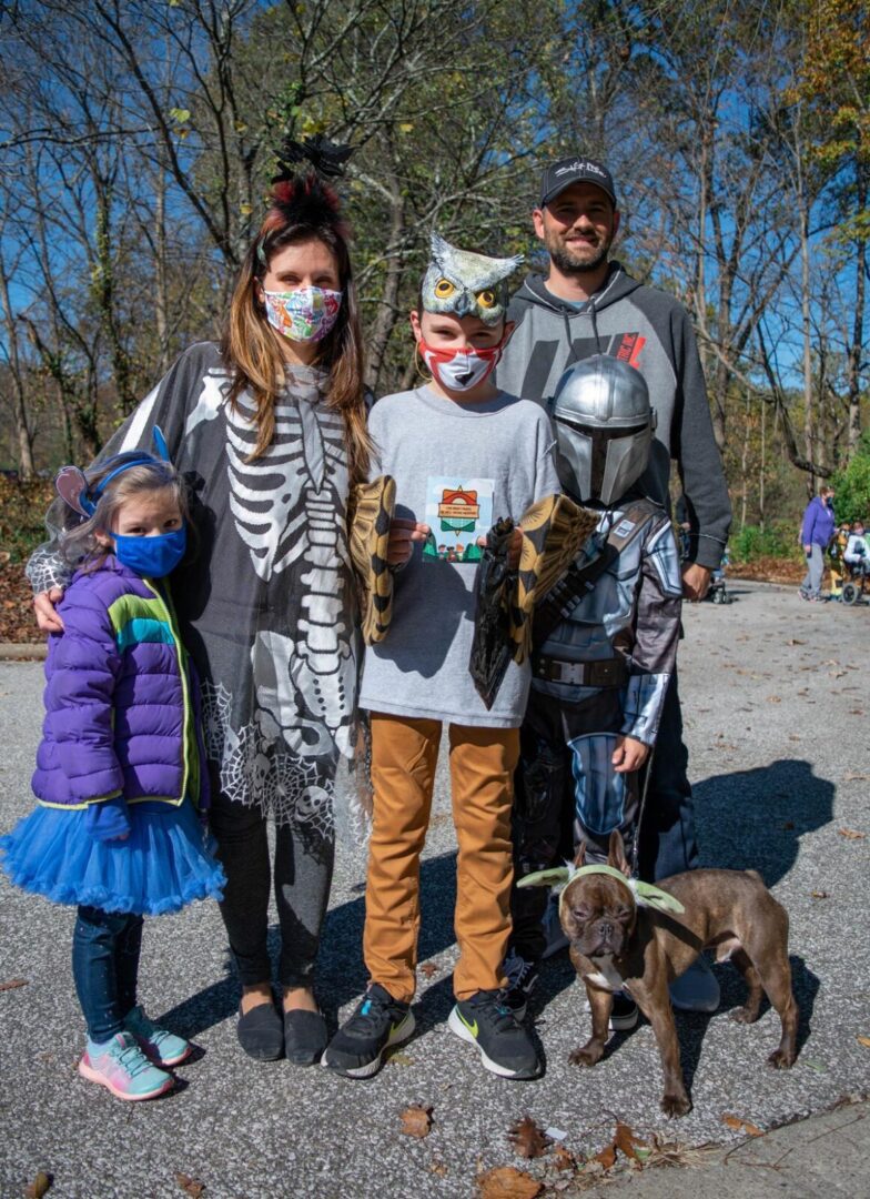 A costumed family at the be.well Halloween Hike with Luke5adventures, Cincinnati Children's. and Cincinnati Parks Foundation