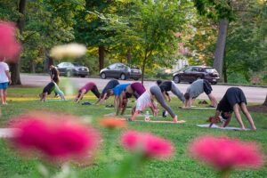 People doing free Cincinnati Yoga at a free wellnes program from Cincinnati Parks Foundation