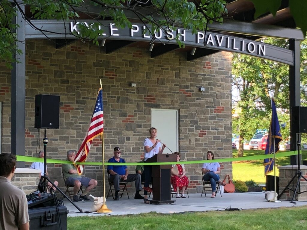 Jennifer Spieser speaking at the ribbon cutting of the Kyle Plush Pavilion in Stanbery Park.