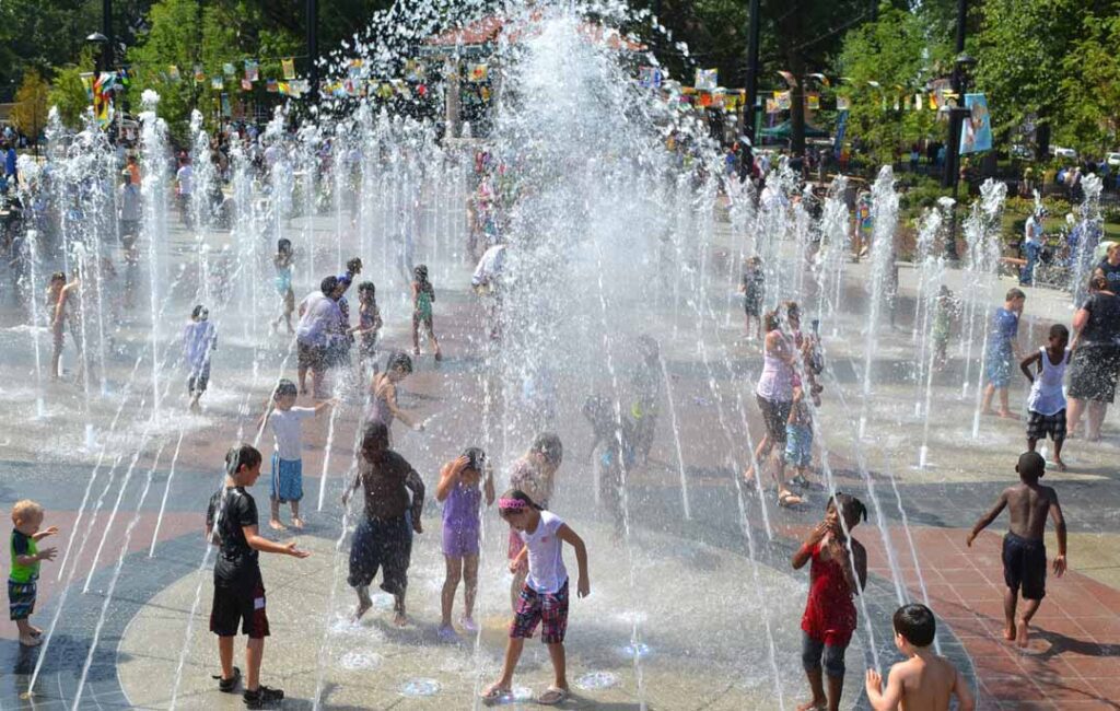 Children enjoying the Armeleder Memorial Sprayground at Washington Park