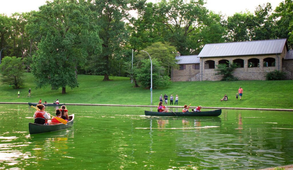 People Canoeing in Rapid Run Park for Canoe and Movie night