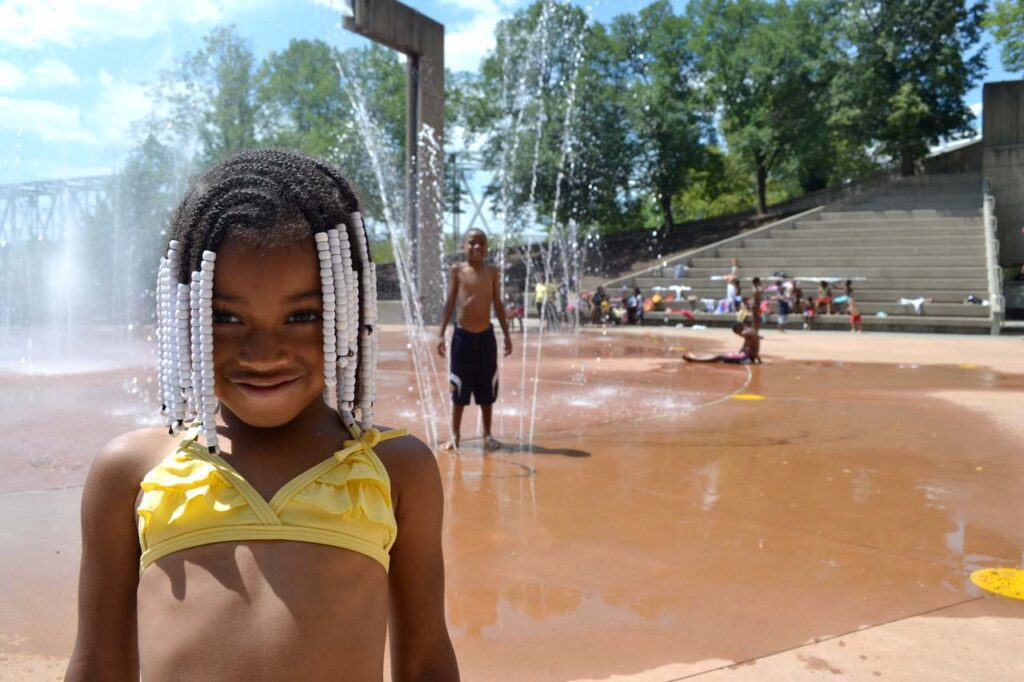 Children enjoying the Armeleder Memorial Sprayground at Sawyer Point