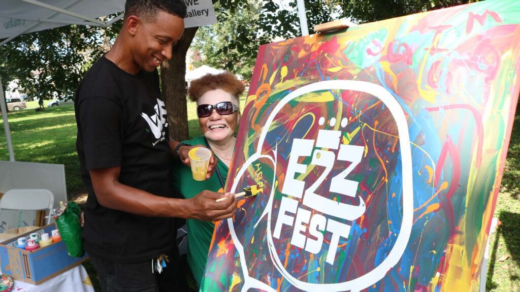 Two people at Ezz Fest in laurel park