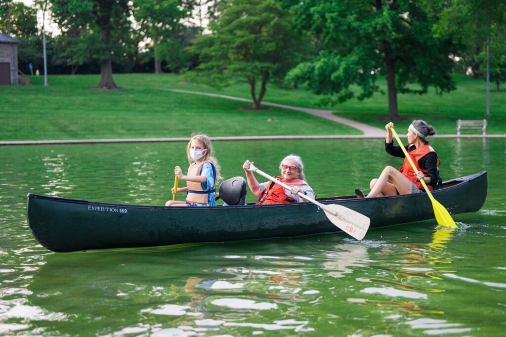 Familt canoeing at a Cincinnati Parks Foundation event