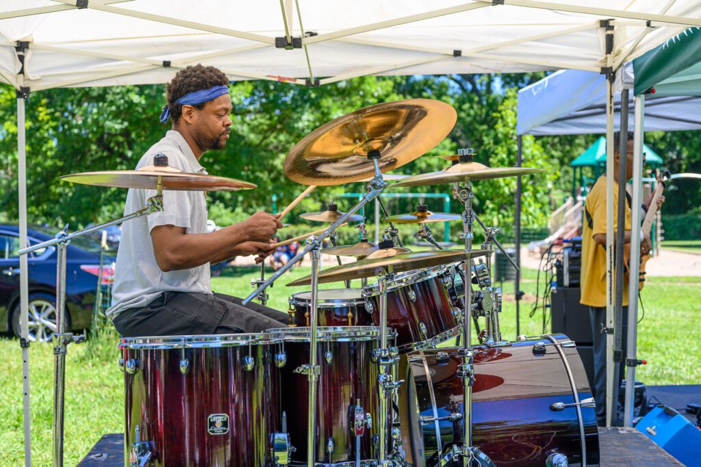 Member of the Positive Vibe band playing at MLK Jr. Park Family Fun Day