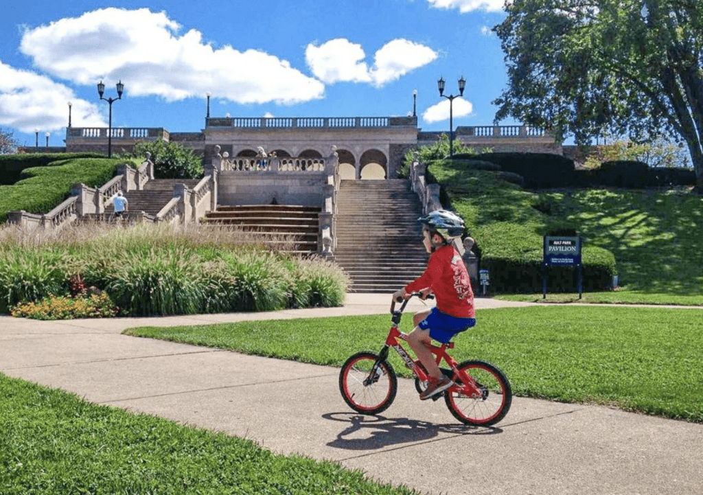 Boy riding a bicycle in Cincinnati Park